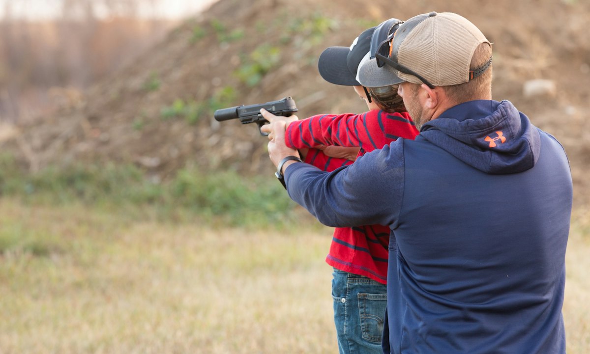 Instructor and student training together on the range